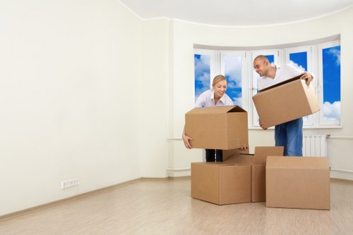 Packed office equipment and labelled boxes ready for a Bermondsey move