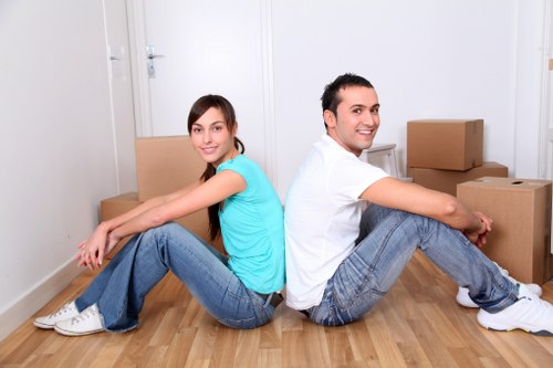 Business furniture and boxes arranged for a Bermondsey office setup